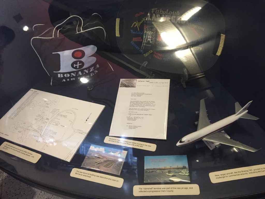 Bonanza Air Lines flight bag and 1960s postcards from Las Vegas McCarran airport.