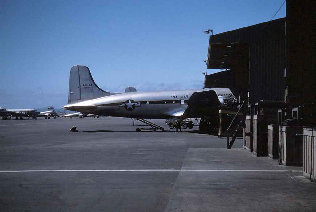 Hickam was naturally a major repair facility for the US Air Force, as seen by these maintenance sheds, which remained at Honolulu well into the 1980s. This early 1950s image shows  49033 USAF MATS C-45 Skymaster. The "Hickam" title on the tail denotes that this aircraft was locally based.