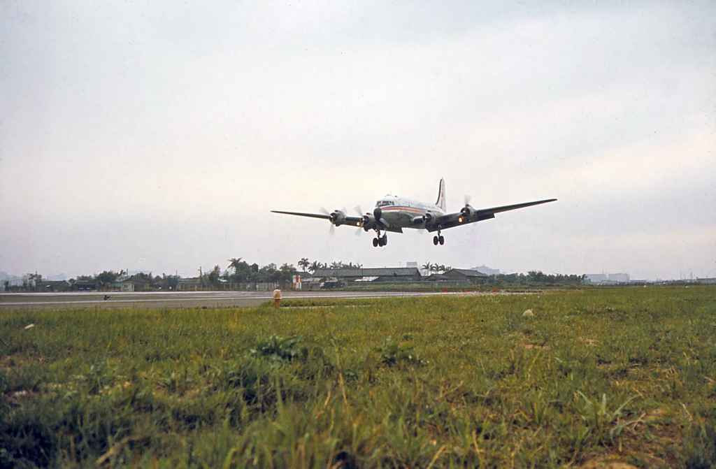 China Airlines DC-4 about to touch down at Taipei Sung Shan airport circa 1971.