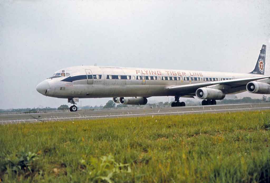 Flying Tigers DC-8-63 N782FT operating a Vietnam War charter at Taipei Sung Shan airport circa 1971.