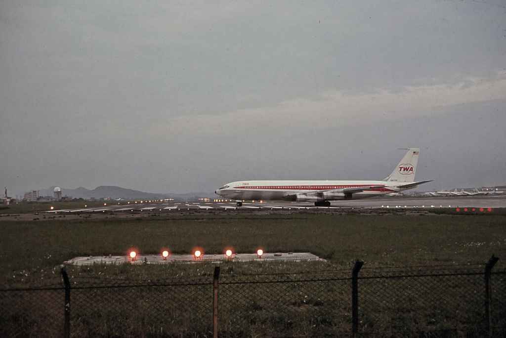 TWA Boeing 707 turning onto the active at Taipei Sung Shan airport 1971. Probably Vietnam troop charter.