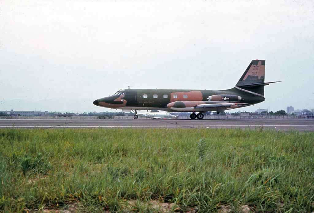 USAF Lockheed C140 Jetstar O-35960 at Taipei Sung Shan airport circa 1971. Probably on a maintenance visit or some other Vietnam War related VIP charter. Note the Vietnam War camouflage scheme. This aircraft was used to test navigational aids.