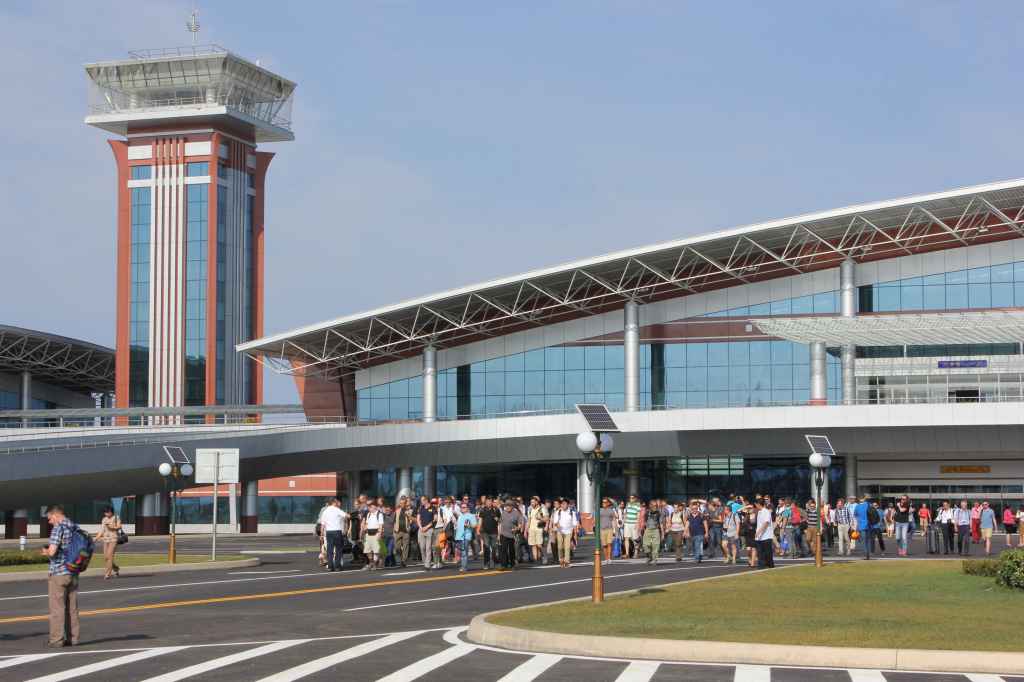 First ever tourists arrive and await tourist busses at new Wonsan Airport DPRK North Korea Sep 24, 2015