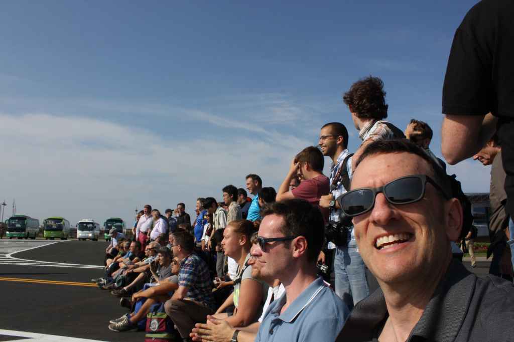 The very first group of tourists to visit the brand new Wonsan Airport DPRK North Korea pose for photos, Sep 24, 2015
