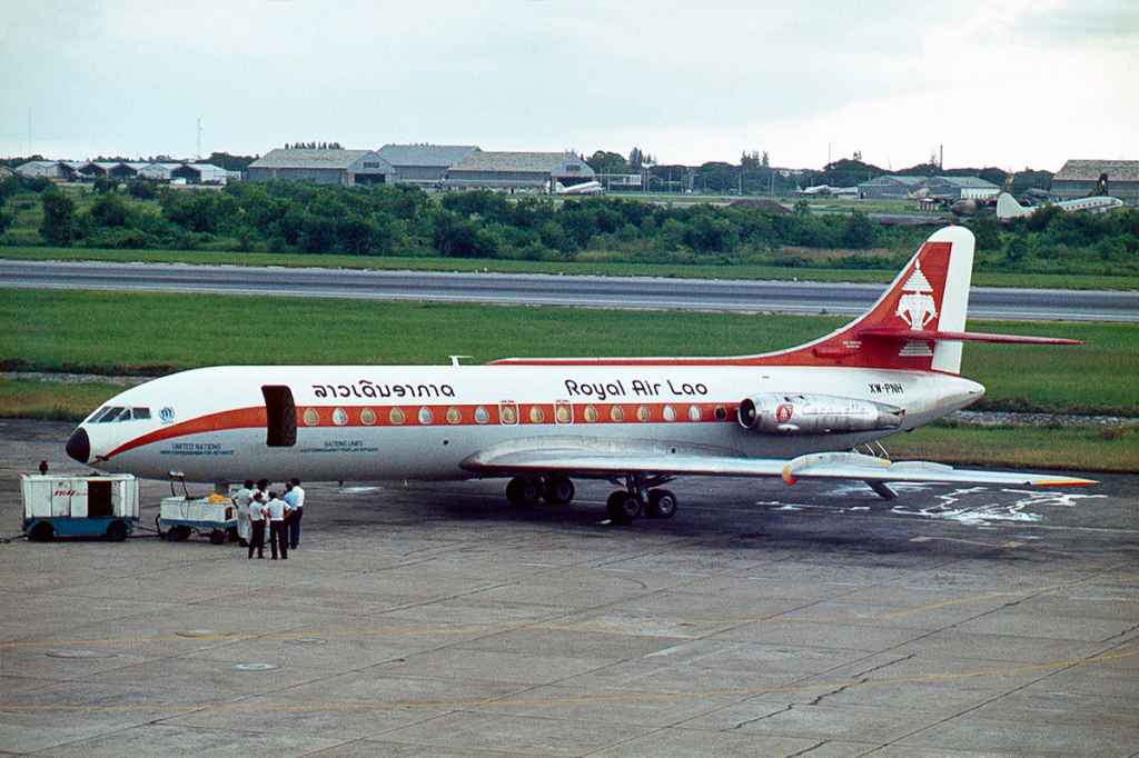 Royal Air Lao Caravelle XW-PNH on the apron at at Bangkok 1975. Photo by Ron Kosys.