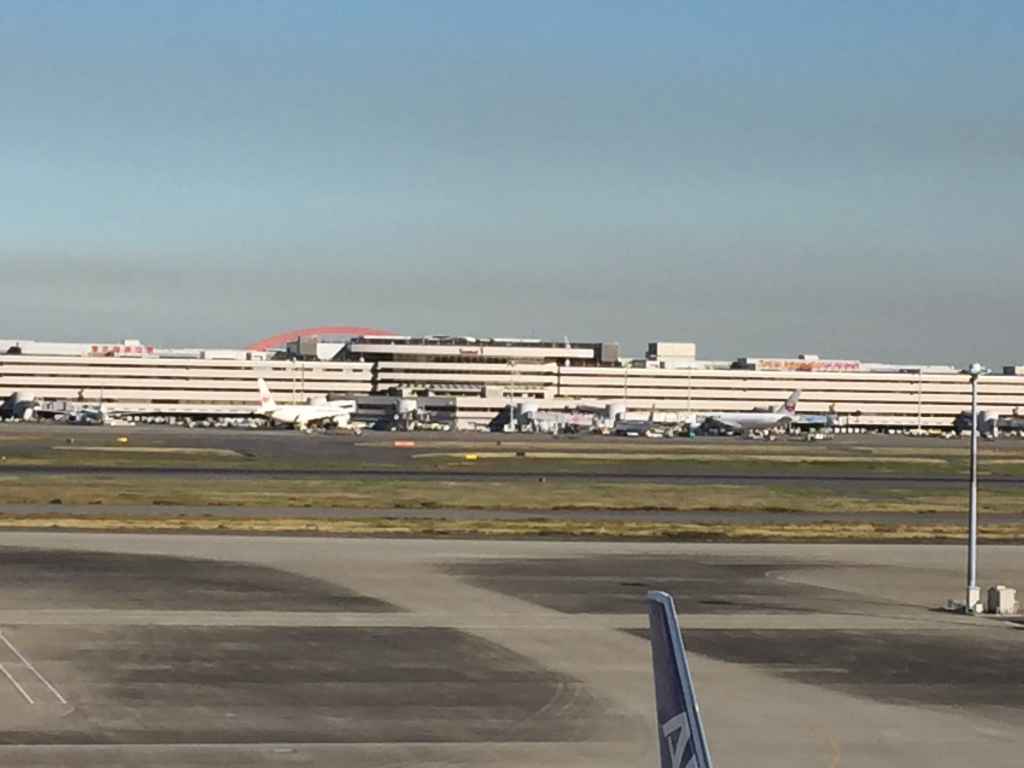 Haneda Airport view across the field to T1 from the International Terminal