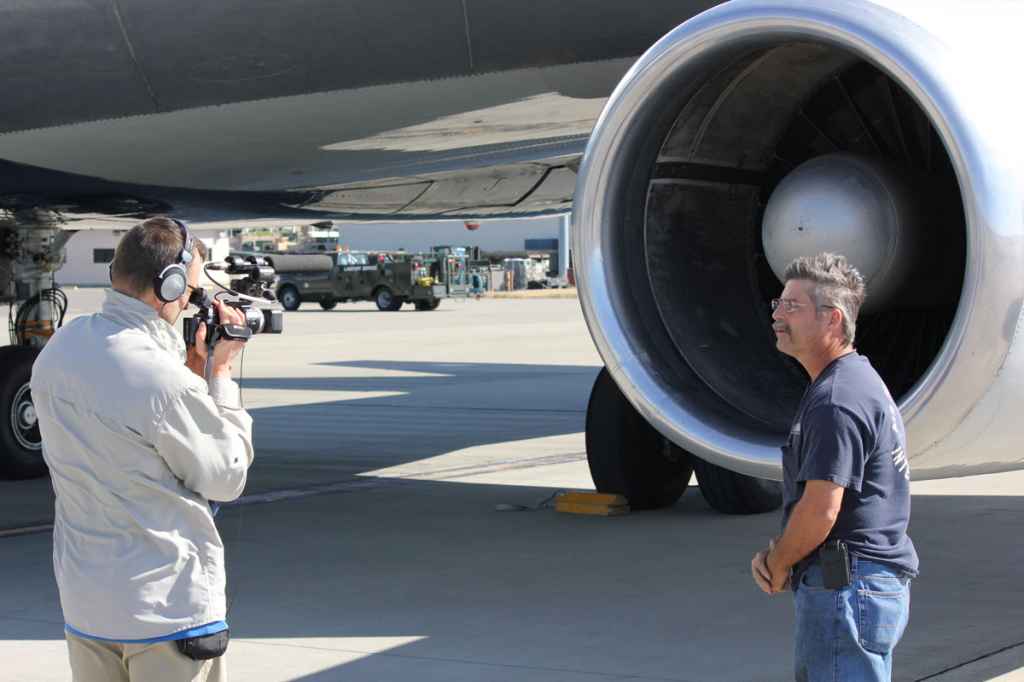 Henry Tenby interviews ATI maintenance engineer Phil Sisco on the apron.