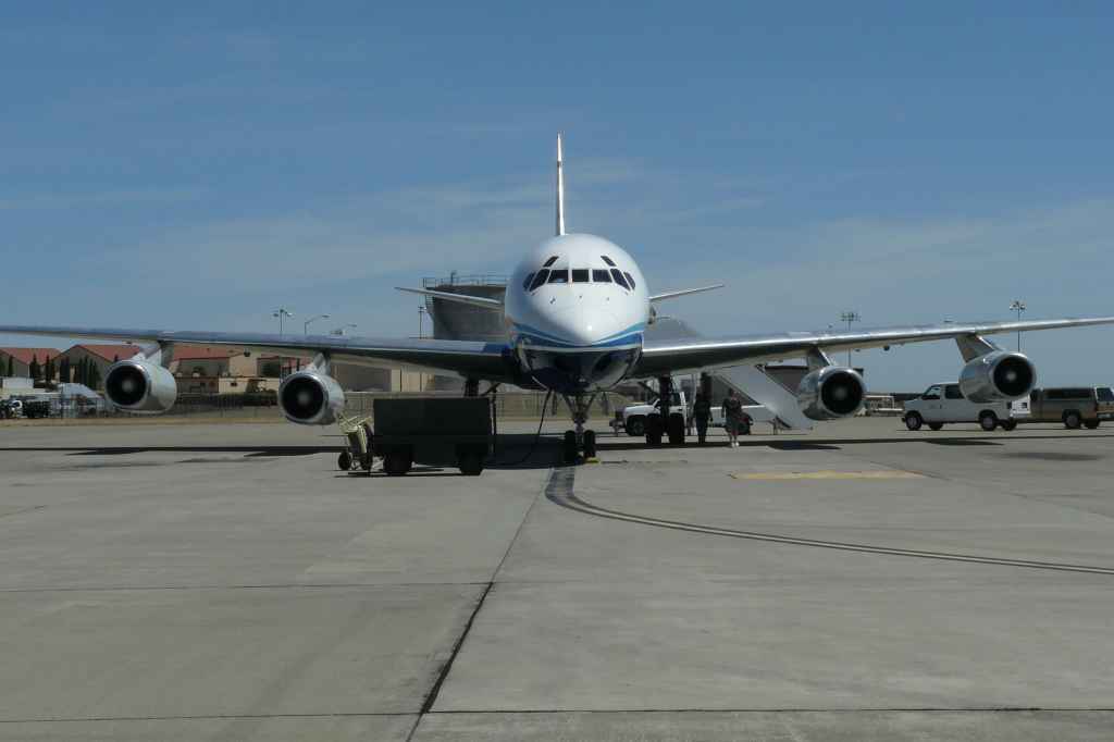 ATI DC-8-62 on the Travis ramp. Passengers have boarded.
