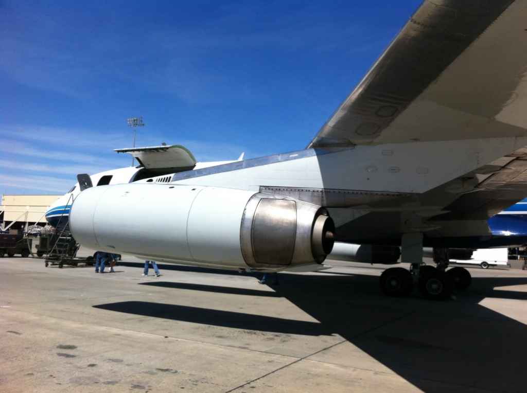 Great engine view as cargo is loaded aboard ATI DC-8-62 N799AL at Travis AFB.