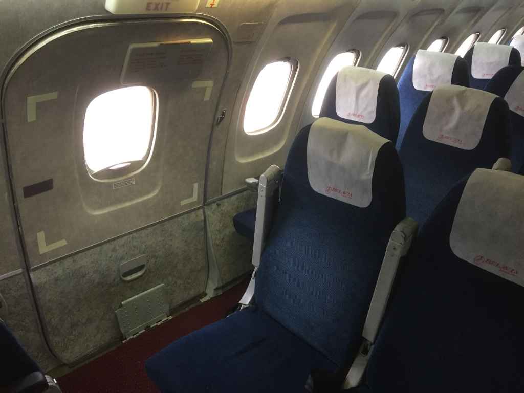 Mid cabin emergency exit row on the Belavia Tu-154.