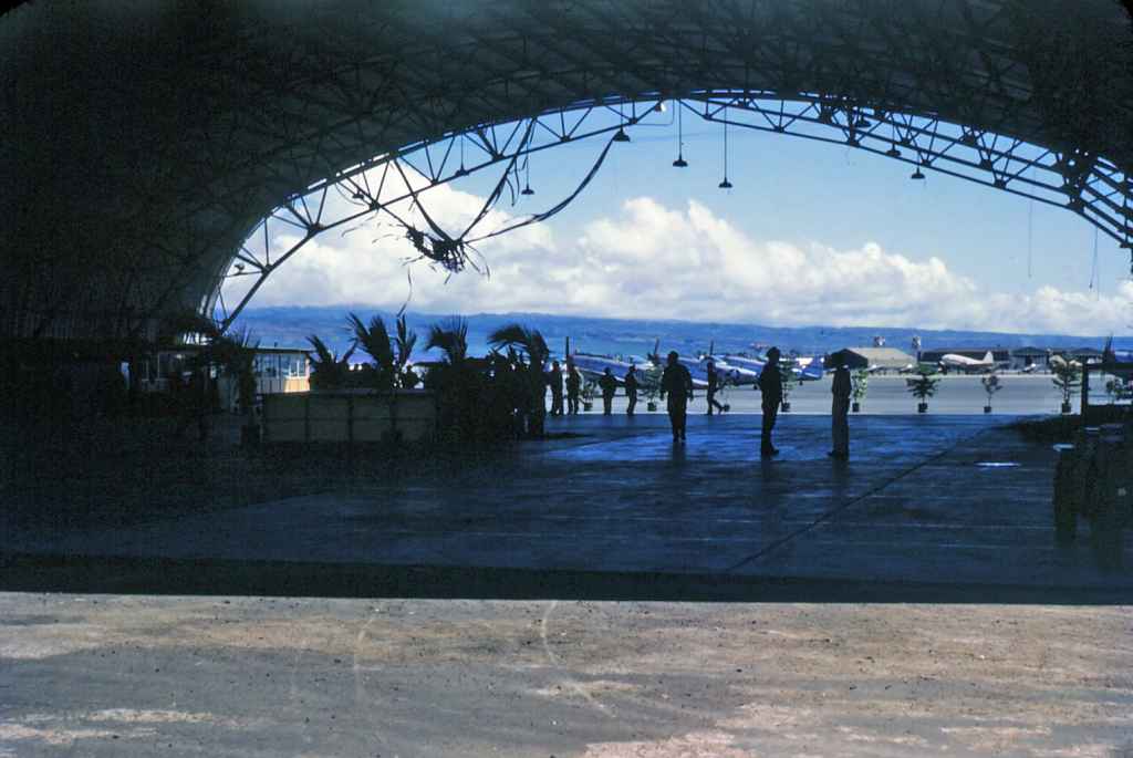 A view to the active dispersal apron, loaded with USAF P-47D Thunderbolts, also referred to as "jugs" because of their jug-shaped fuselages.