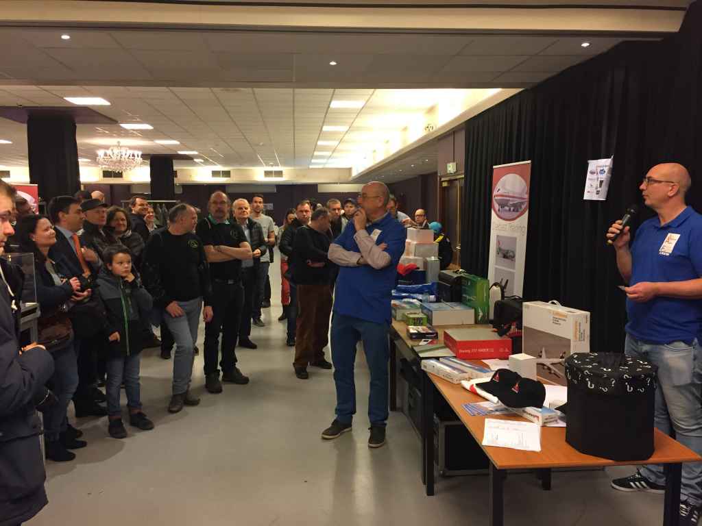 This is show organizer Patrick van Rooijen officiating the door prize raffle.