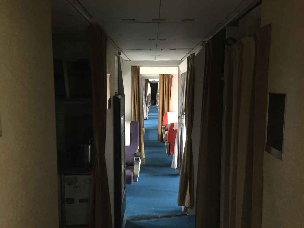Rear facing VIP cabin view as seen from the front entrance door aboard Vickers VC-10 G-ARVF at the Hermeskeil aviation museum in Germany.