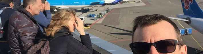 Top 10 Reasons Why Amsterdam Schiphol is My Favourite Airport! Henry Tenby thoroughly enjoying his time soaking up the action on the open air observation deck at Amsterdam Schiphol airport.