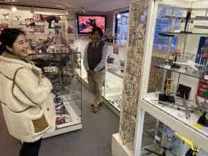 Happy visitors to the Wing Club aircraft display model store in Tokyo, Japan.