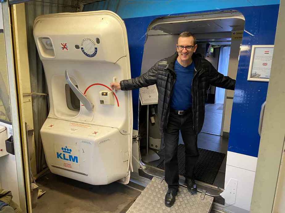 Henry Tenby at passenger door of KLM 747-300 PH-BUK at Aviodrome, Netherlands.