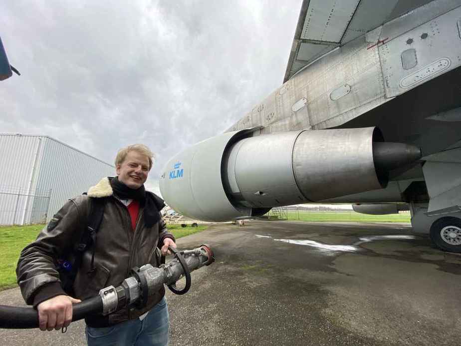 Niels Dam prepares to connect hydrant fuelling connection to KLM Boeing 747-300 PH-BUK at Aviodrome, Netherlands.