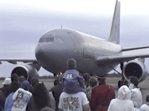 Crowd at Yellowknife airport greet the Queen's arrival from opening the Commonwealth Games in Victoria on August 19, 1994, as video documented by Henry Tenby.