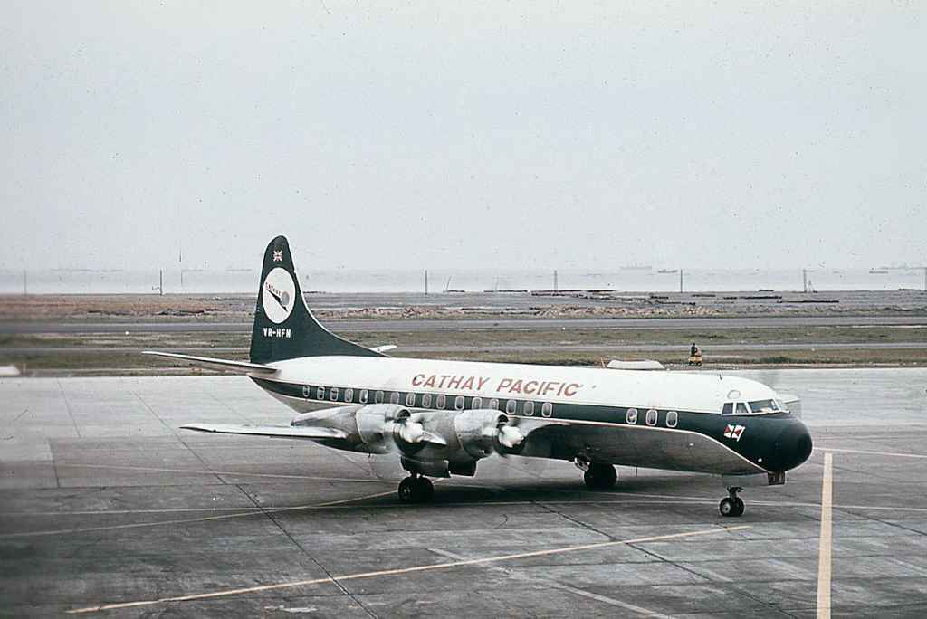 Cathay Pacific Airways Lockheed L-188 Electra VR-HFN at Tokyo Haneda airport circa 1960.