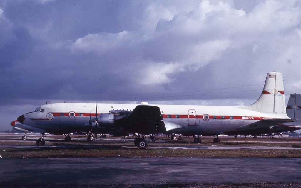 Saturn Airways DC-7 N90774 circa mid 1960s.