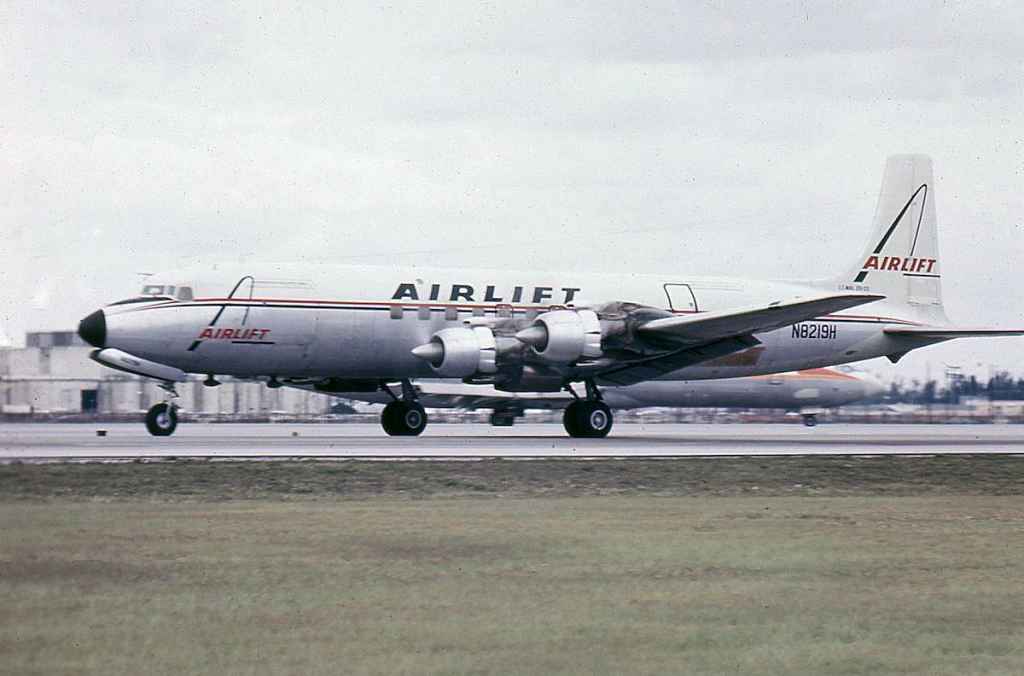 Airlift International DC-7F N8219H at Miami circa mid 1960s.