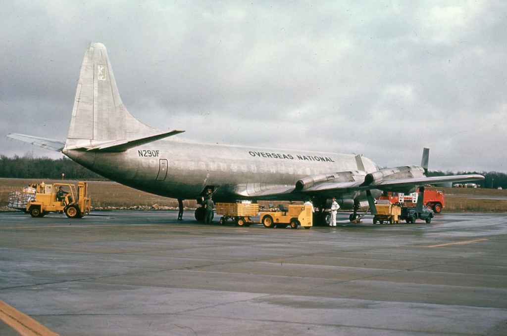 ONA Overseas National Airways L-188 N852F circa mid 1970s, in a bare metal scheme.