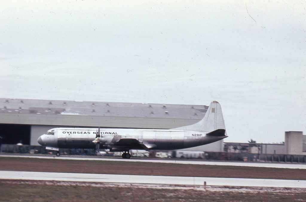 ONA Overseas National Airways L-188 Electra N281F bare metal scheme at Miami circa mid 1970s.