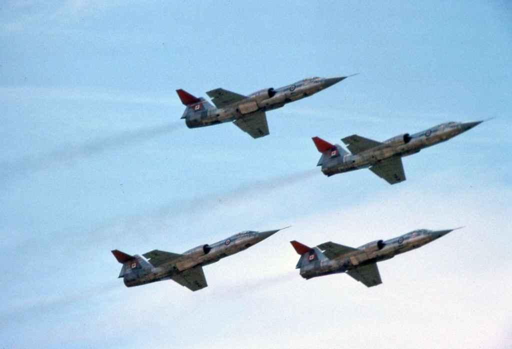 Canadian Armed Force CF104 Starfighters 4 ship battle formation flypast at the Abbotsford Airshow August 1975.