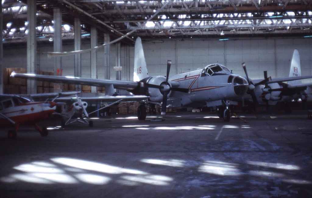Former RCAF Lockheed P-2 Neptune being converted to water bomber A16 March 1973.