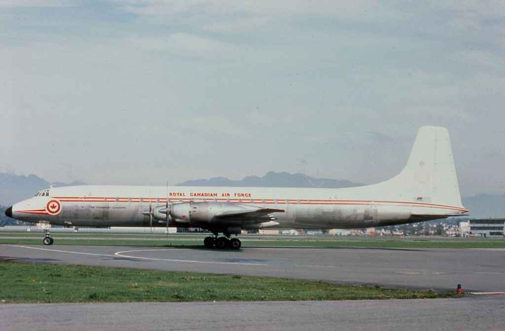 RCAF Royal Canadian Air Force Canadair Yukon 15925 at Vancouver in the special one year only all red 1967 scheme in 1967.