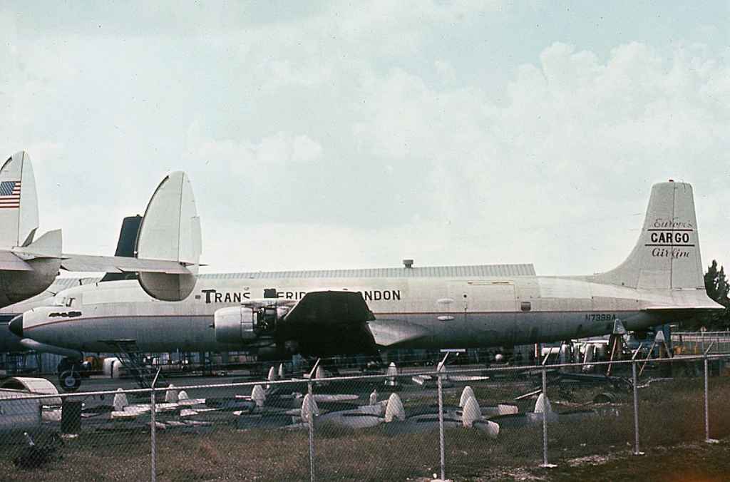 Former Trans Meridian London cargo DC-7 N7398A at Miami early 1970s.