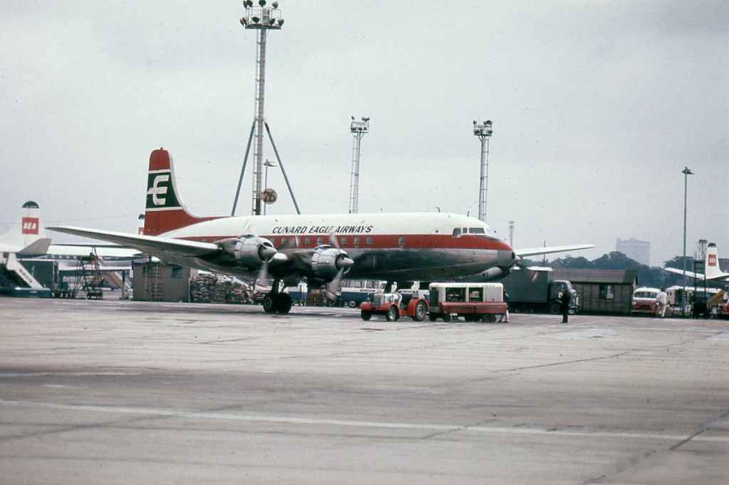 Cunard Eagle Airways DC-6 no reg visible at London Heathrow circa 1962.