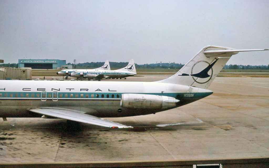 North Central DC-9-30 N961N plus two North Central Convair 580s at the gate at DTW AUG 1976.